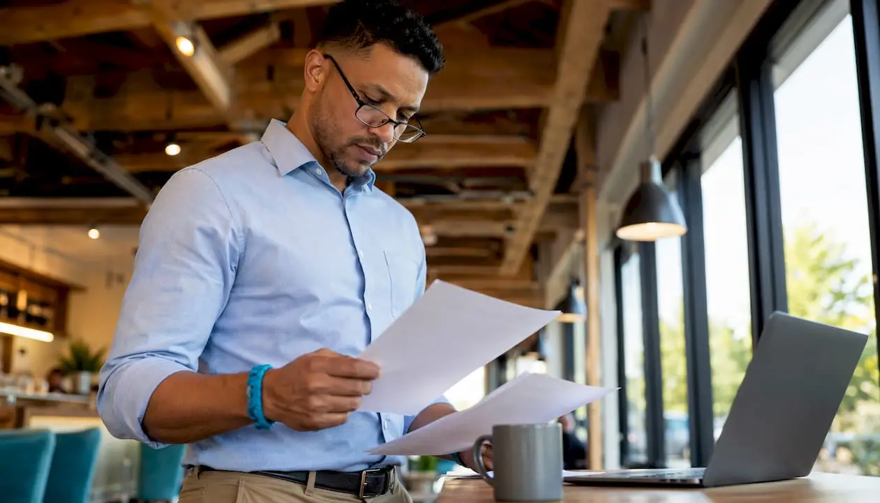 IT professional managing hardware and software inventory documents